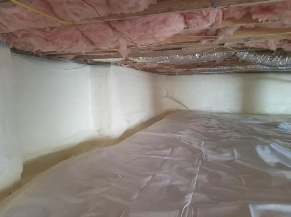 Crawl space encapsulation with closed-cell spray foam for Commercial Roof Restoration in Woodland